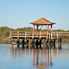 mtns2molhilz > Pier and walkway, Kleberg park, Kingsville.  Opposite shore has a loop trail that can be productive early in the morning.  This large pond can add to one's Valley list with ducks, grebes and some shorebirds, if a visit to coastal habitats further south is not planned.